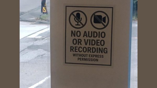 Sign reading No audio or video recording without express permission on a door in Leeds, Alabama